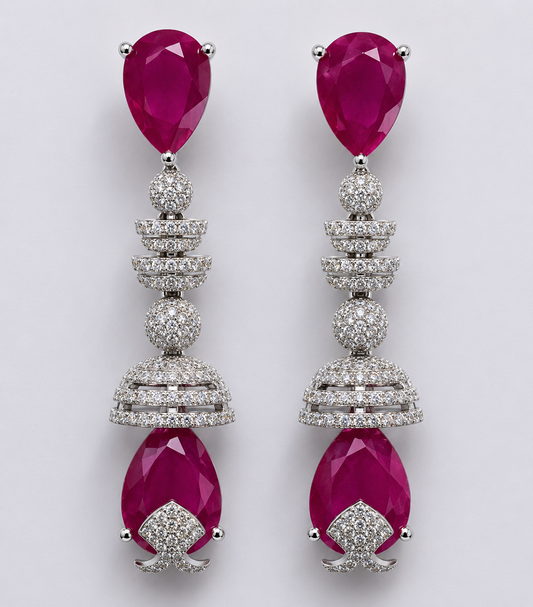 Silver-tone hoop earrings with Ruby pink stones.