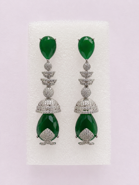 Silver-tone hoop earrings with green tones stones